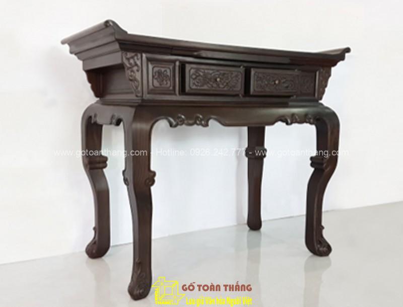 Bàn Thờ Gia Tiên gỗ Chiu Liu Cuốn thư 134 BGT-08 Mẫu sập thờ gia tiên được làm bằng chất liệu gỗ Chiu Liu (gỗ Chiêu Liêu) với họa tiết Cuốn thư đơn giản, hiện đại